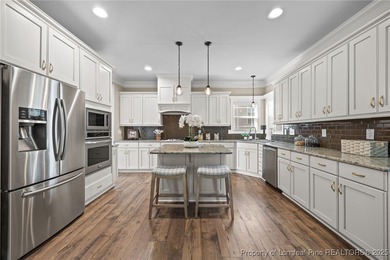 Welcome to this stunning executive-style custom home offering 5 on Kings Grant Golf and Country Club in North Carolina - for sale on GolfHomes.com, golf home, golf lot