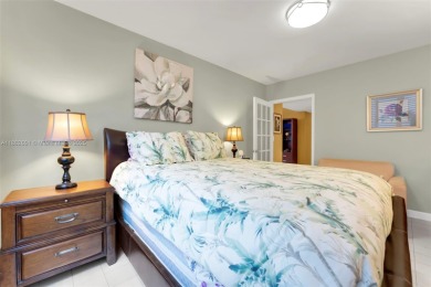 Beautifully updated 2-bed, 2-bath condo in an all-ages on Hillcrest Golf and Country Club in Florida - for sale on GolfHomes.com, golf home, golf lot