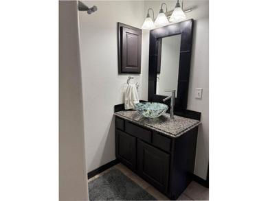 Wake up to lake views and easy living on Table Rock Lake. This on Holiday Island Executive Golf Course in Arkansas - for sale on GolfHomes.com, golf home, golf lot