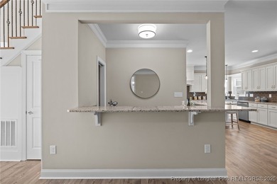 Welcome to this stunning executive-style custom home offering 5 on Kings Grant Golf and Country Club in North Carolina - for sale on GolfHomes.com, golf home, golf lot