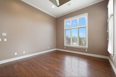 This 4 bed, 3.5 bath home is located in the San Poppi on Millwood Golf and Racquet Club in Missouri - for sale on GolfHomes.com, golf home, golf lot