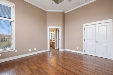 This 4 bed, 3.5 bath home is located in the San Poppi on Millwood Golf and Racquet Club in Missouri - for sale on GolfHomes.com, golf home, golf lot