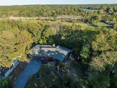 Welcome to this delightful ranch-style home, where stone accents on Bella Vista Country Club - Berksdale in Arkansas - for sale on GolfHomes.com, golf home, golf lot