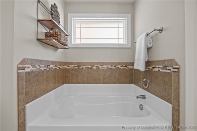 Welcome to this stunning executive-style custom home offering 5 on Kings Grant Golf and Country Club in North Carolina - for sale on GolfHomes.com, golf home, golf lot