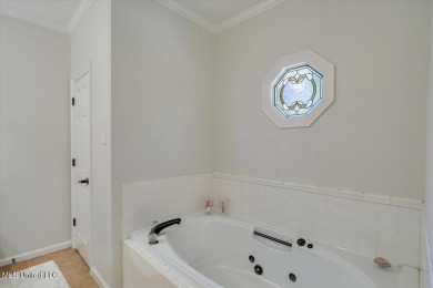 Welcome to 430 Bay Pointe Circle!  This golf course community is on Bay Pointe Golf and Resort in Mississippi - for sale on GolfHomes.com, golf home, golf lot