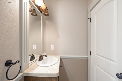 This 4 bed, 3.5 bath home is located in the San Poppi on Millwood Golf and Racquet Club in Missouri - for sale on GolfHomes.com, golf home, golf lot