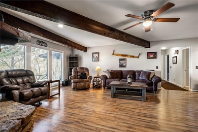 Welcome to this delightful ranch-style home, where stone accents on Bella Vista Country Club - Berksdale in Arkansas - for sale on GolfHomes.com, golf home, golf lot