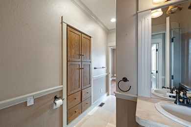 This 4 bed, 3.5 bath home is located in the San Poppi on Millwood Golf and Racquet Club in Missouri - for sale on GolfHomes.com, golf home, golf lot