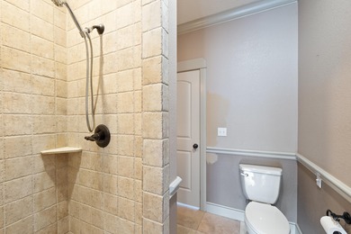 This 4 bed, 3.5 bath home is located in the San Poppi on Millwood Golf and Racquet Club in Missouri - for sale on GolfHomes.com, golf home, golf lot