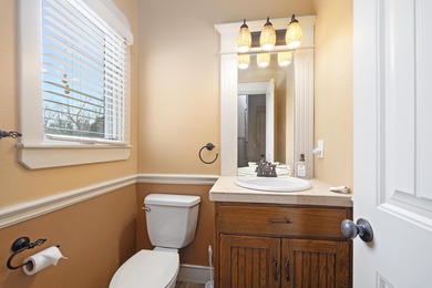 This 4 bed, 3.5 bath home is located in the San Poppi on Millwood Golf and Racquet Club in Missouri - for sale on GolfHomes.com, golf home, golf lot