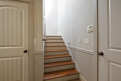 This 4 bed, 3.5 bath home is located in the San Poppi on Millwood Golf and Racquet Club in Missouri - for sale on GolfHomes.com, golf home, golf lot