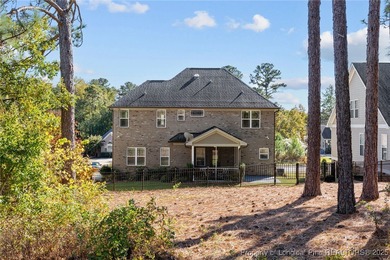 Welcome to this stunning executive-style custom home offering 5 on Kings Grant Golf and Country Club in North Carolina - for sale on GolfHomes.com, golf home, golf lot