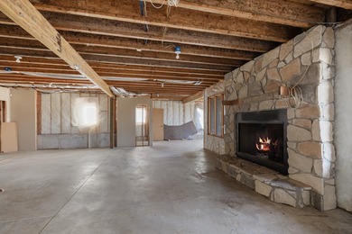 This 4 bed, 3.5 bath home is located in the San Poppi on Millwood Golf and Racquet Club in Missouri - for sale on GolfHomes.com, golf home, golf lot