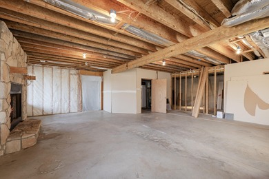 This 4 bed, 3.5 bath home is located in the San Poppi on Millwood Golf and Racquet Club in Missouri - for sale on GolfHomes.com, golf home, golf lot