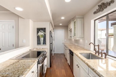 This beautifully remodeled TH offers the perfect balance of on Arizona Grand Resort Golf Course in Arizona - for sale on GolfHomes.com, golf home, golf lot