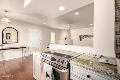 This beautifully remodeled TH offers the perfect balance of on Arizona Grand Resort Golf Course in Arizona - for sale on GolfHomes.com, golf home, golf lot