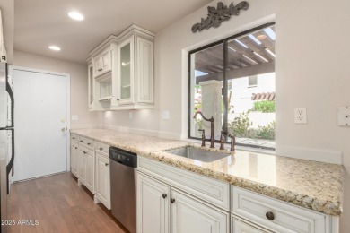 This beautifully remodeled TH offers the perfect balance of on Arizona Grand Resort Golf Course in Arizona - for sale on GolfHomes.com, golf home, golf lot