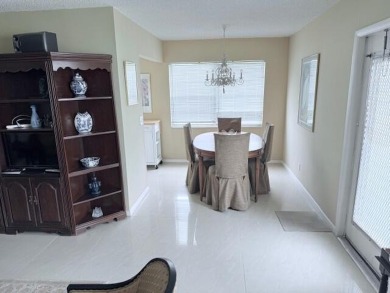 Very desirable 1st floor corner unit with newer kitchen (shaker on Hillsboro Pines Golf in Florida - for sale on GolfHomes.com, golf home, golf lot