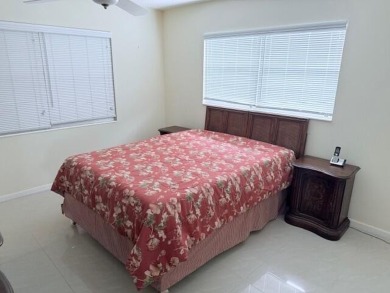 Very desirable 1st floor corner unit with newer kitchen (shaker on Hillsboro Pines Golf in Florida - for sale on GolfHomes.com, golf home, golf lot