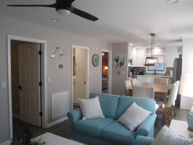 This is a condo that you don't want to miss in the popular on Surf Golf and Beach Club in South Carolina - for sale on GolfHomes.com, golf home, golf lot