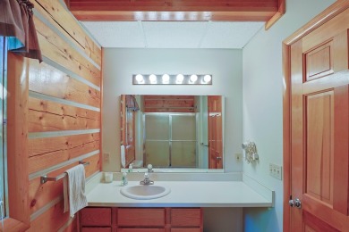 This fully furnished cottage can be your personal oasis or a on Garland Resort and Golf Club  in Michigan - for sale on GolfHomes.com, golf home, golf lot