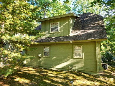 This fully furnished cottage can be your personal oasis or a on Garland Resort and Golf Club  in Michigan - for sale on GolfHomes.com, golf home, golf lot