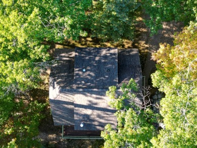 This fully furnished cottage can be your personal oasis or a on Garland Resort and Golf Club  in Michigan - for sale on GolfHomes.com, golf home, golf lot