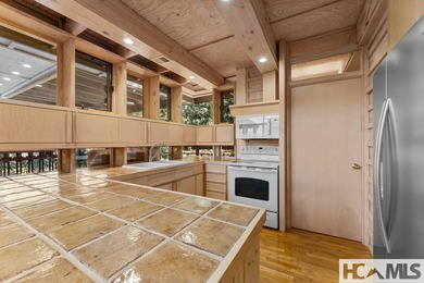 Live behind the gates of Wildcat Cliffs Country Club. Perfectly on Wildcat Cliffs Country Club in North Carolina - for sale on GolfHomes.com, golf home, golf lot