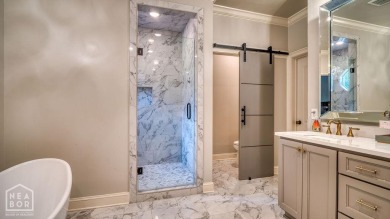 Nestled on a picturesque .33-acre golf course lot with wooded on RidgePointe Country Club in Arkansas - for sale on GolfHomes.com, golf home, golf lot