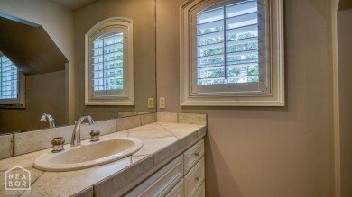 Nestled on a picturesque .33-acre golf course lot with wooded on RidgePointe Country Club in Arkansas - for sale on GolfHomes.com, golf home, golf lot