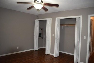 This property is within walking distance to golf course, close on Cherokee Village North Course in Arkansas - for sale on GolfHomes.com, golf home, golf lot