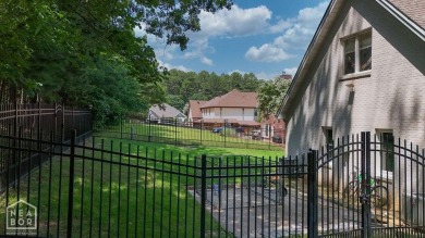Nestled on a picturesque .33-acre golf course lot with wooded on RidgePointe Country Club in Arkansas - for sale on GolfHomes.com, golf home, golf lot