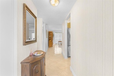Welcome to this beautifully maintained first-floor condo with a on Cooper Colony Country Club in Florida - for sale on GolfHomes.com, golf home, golf lot