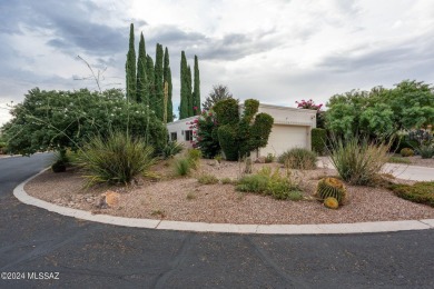 Discover tranquility and entertainment in this fully furnished on Omni Tucson National Golf Resort and Spa - Catalina in Arizona - for sale on GolfHomes.com, golf home, golf lot