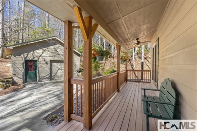 Step into the Highlands-Cashiers Plateau lifestyle with this on Sapphire National Golf Club in North Carolina - for sale on GolfHomes.com, golf home, golf lot