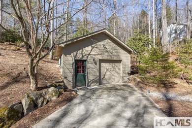 Step into the Highlands-Cashiers Plateau lifestyle with this on Sapphire National Golf Club in North Carolina - for sale on GolfHomes.com, golf home, golf lot