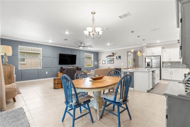 PRICE DROP OF $10,000!!!  PLUS 2016 EZ GO golf cart included!!! on On Top of the World Golf Course in Florida - for sale on GolfHomes.com, golf home, golf lot