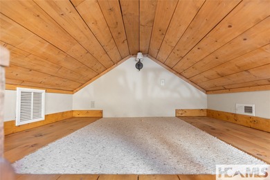 Step into the Highlands-Cashiers Plateau lifestyle with this on Sapphire National Golf Club in North Carolina - for sale on GolfHomes.com, golf home, golf lot