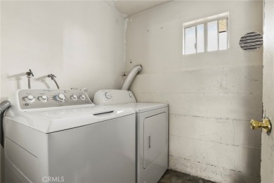 Welcome to this beautiful, newly painted all-white 2nd-floor on Hansen Dam Golf Course in California - for sale on GolfHomes.com, golf home, golf lot