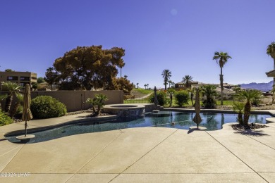 This home is located at the end of a private cul-de-sac in the on London Bridge Golf Course in Arizona - for sale on GolfHomes.com, golf home, golf lot