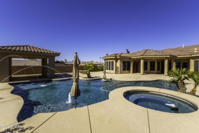 This home is located at the end of a private cul-de-sac in the on London Bridge Golf Course in Arizona - for sale on GolfHomes.com, golf home, golf lot