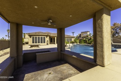 This home is located at the end of a private cul-de-sac in the on London Bridge Golf Course in Arizona - for sale on GolfHomes.com, golf home, golf lot