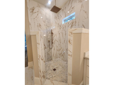 A stunning new custom home by the renowned Carrell Group is on The Members Club At Grande Dunes in South Carolina - for sale on GolfHomes.com, golf home, golf lot