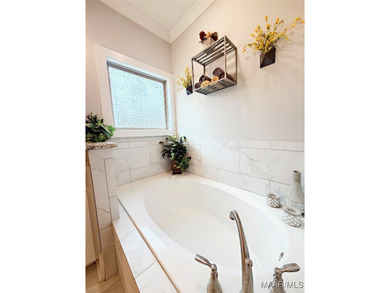 Located on the golf course in Emerald Mountain with flowing on Emerald Mountain Golf Course in Alabama - for sale on GolfHomes.com, golf home, golf lot