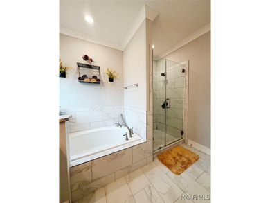 Located on the golf course in Emerald Mountain with flowing on Emerald Mountain Golf Course in Alabama - for sale on GolfHomes.com, golf home, golf lot