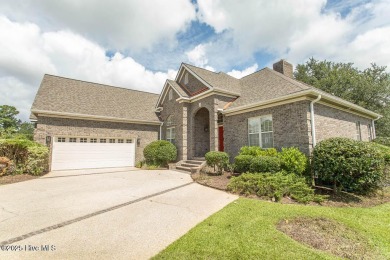 Proudly presenting this low-maintenance brick home located on on Ocean Ridge Plantation in North Carolina - for sale on GolfHomes.com, golf home, golf lot