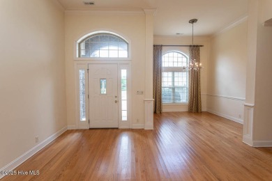 Proudly presenting this low-maintenance brick home located on on Ocean Ridge Plantation in North Carolina - for sale on GolfHomes.com, golf home, golf lot