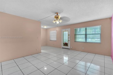 Immaculately kept in the sought after community of Century on Flamingo Lakes Country Club in Florida - for sale on GolfHomes.com, golf home, golf lot