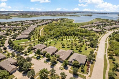 Resort-style living awaits in this stunning 55+ active community on Frisco Lakes Golf Course in Texas - for sale on GolfHomes.com, golf home, golf lot