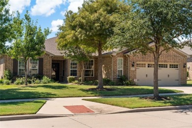 Resort-style living awaits in this stunning 55+ active community on Frisco Lakes Golf Course in Texas - for sale on GolfHomes.com, golf home, golf lot